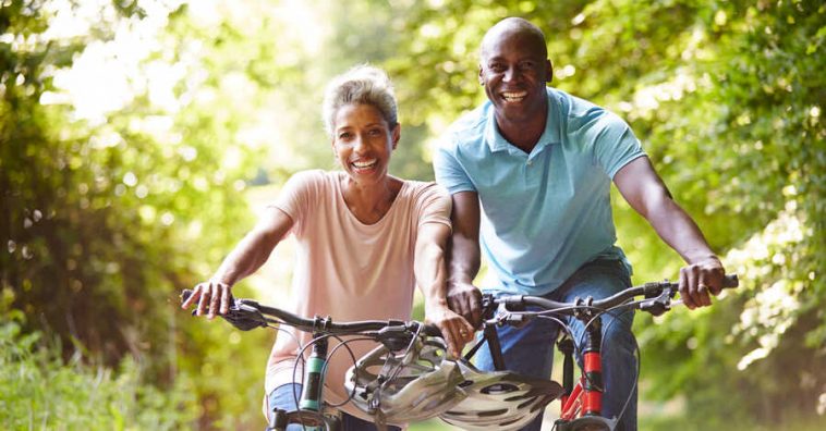 Mature-Couple-On-Cycle-Ride